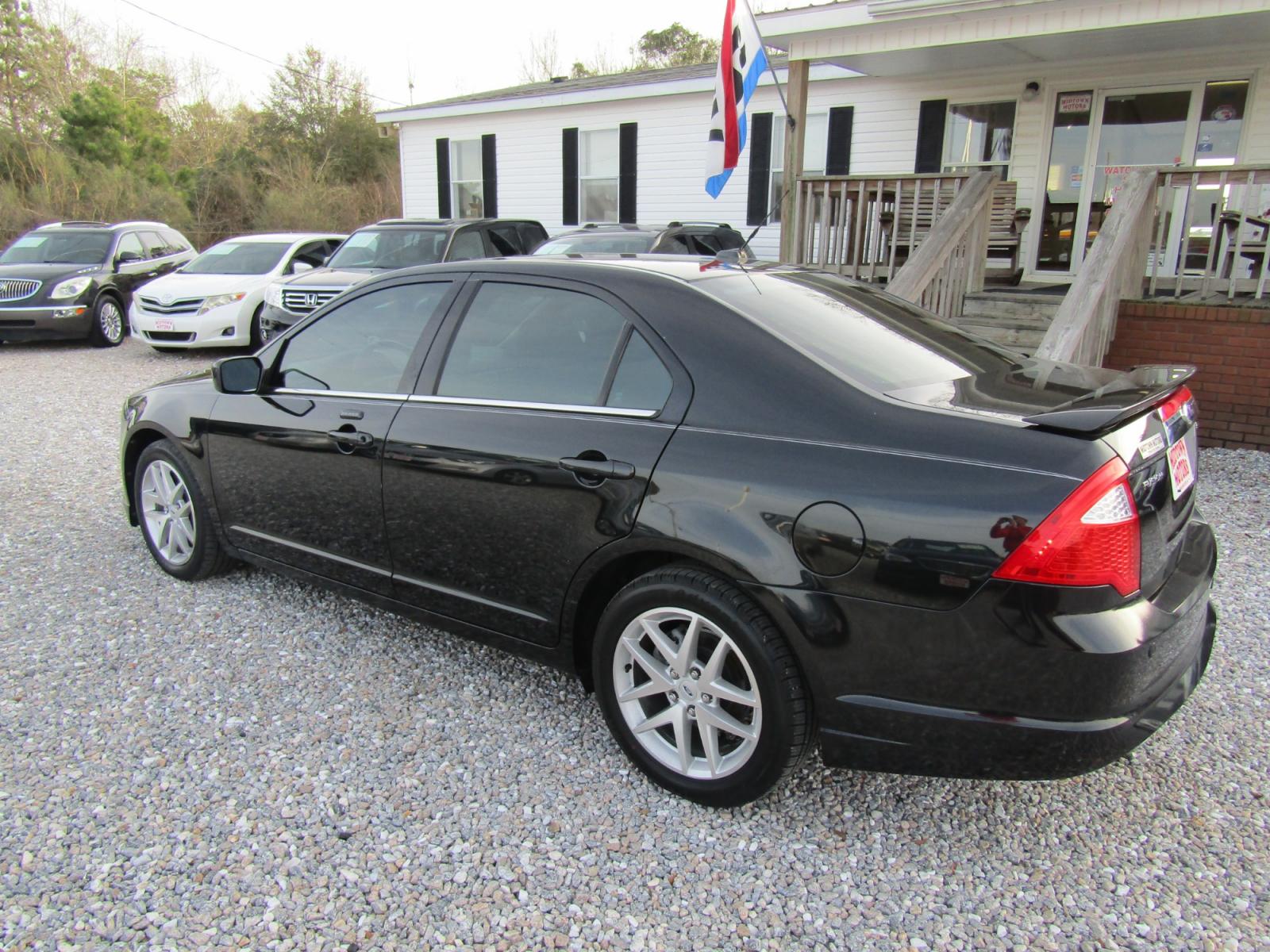 2011 Black /Tan Ford Fusion (3FAHP0JG4BR) , Automatic transmission, located at 15016 S Hwy 231, Midland City, AL, 36350, (334) 983-3001, 31.306210, -85.495277 - Photo #5